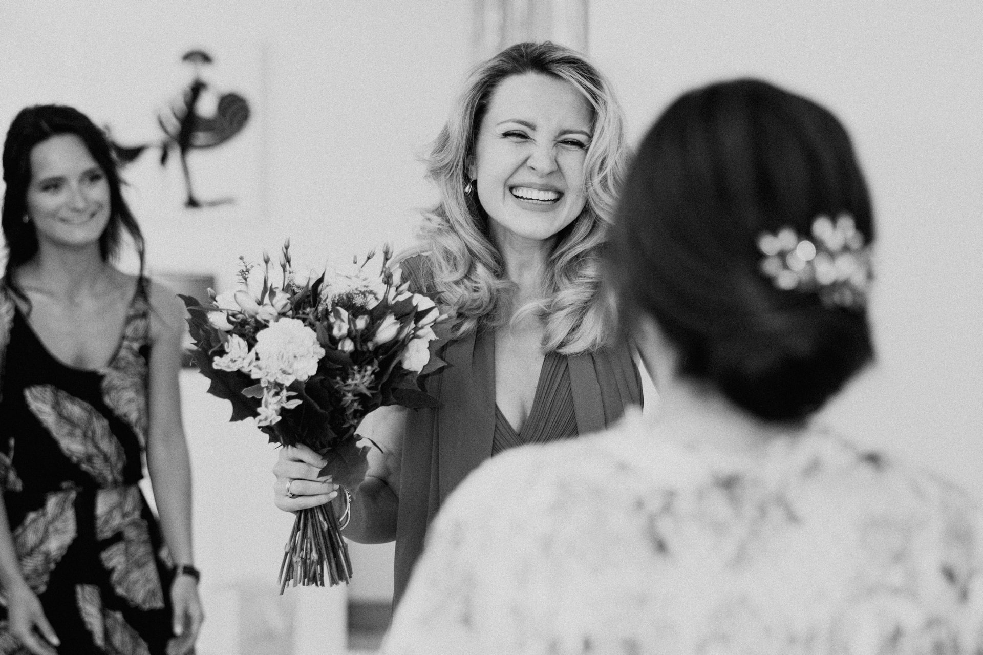 bride and family getting ready with the hairdresser